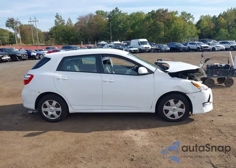 2009 Toyota Matrix S из США, поврежденный, VIN 2T1LE40E29C003423